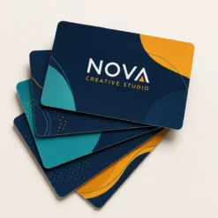 Custom PVC business card printing with a fanned visiting card stack