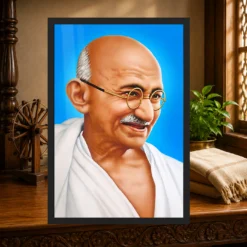 Mahatma Gandhi Blue Background Portrait Photo Frame 13 Mahatma Gandhi clear smiling Gandhi portrait on a blue background photo frame – Heritage Study Display