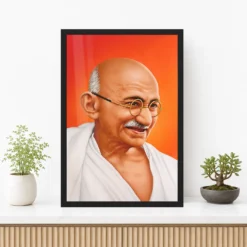 Mahatma Gandhi clear smiling Gandhi portrait on a orange background photo frame – Premium Console Display