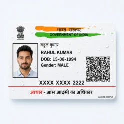 Water-resistant Masked Aadhaar PVC card sample with droplets and consistent Rahul Kumar details