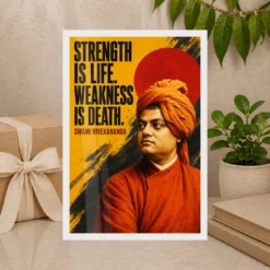 Swami Vivekananda Strength Is Life Quote Photo Frame showing a bold mustard-and-black screen poster with the Strength Is Life quote – Premium Gift Display View